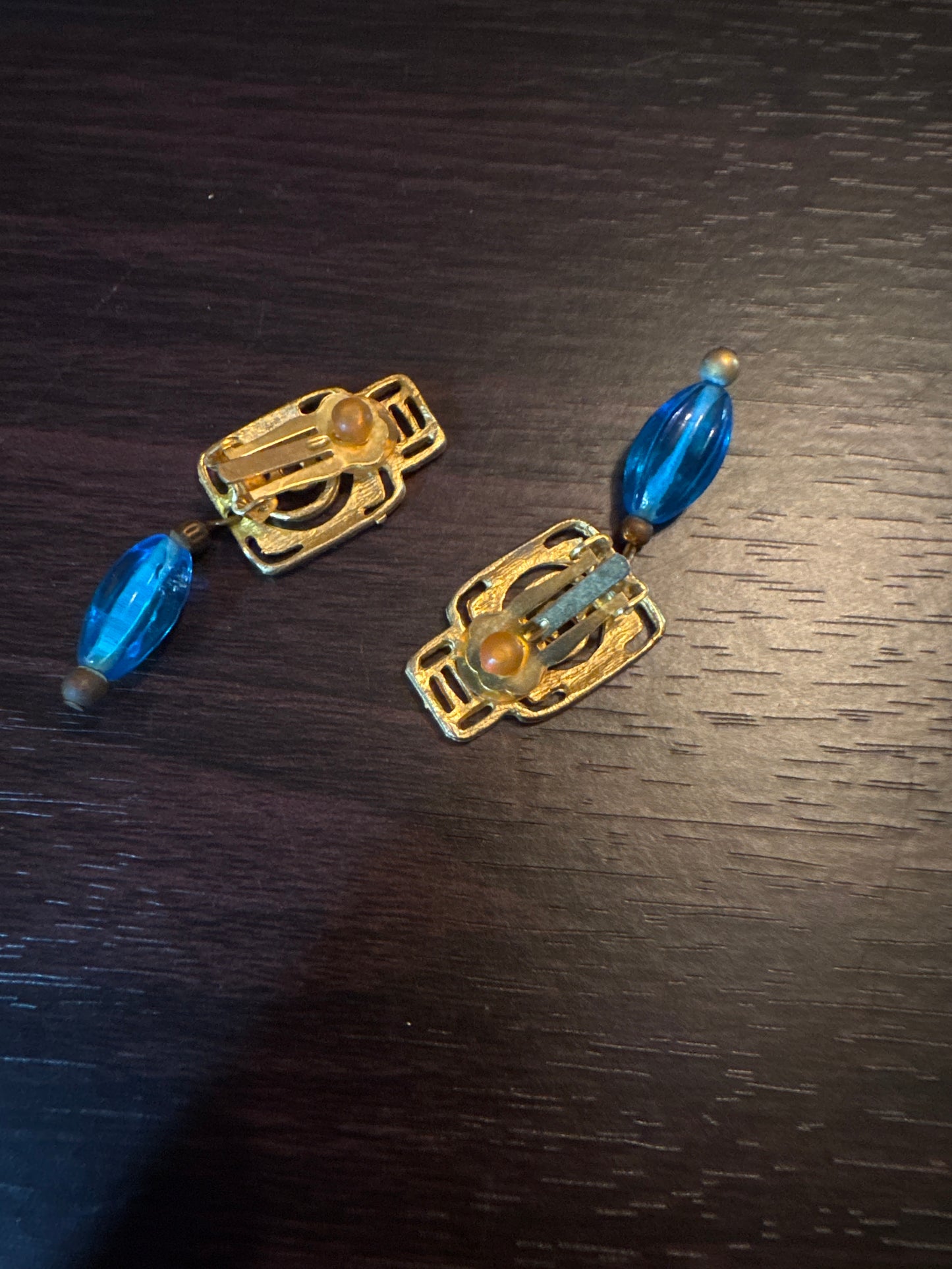 Vintage Gold Tone Spiral Earrings with Blue Glass Drops - Geometric Dangle Style