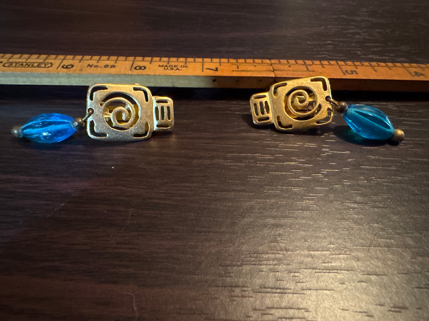 Vintage Gold Tone Spiral Earrings with Blue Glass Drops - Geometric Dangle Style
