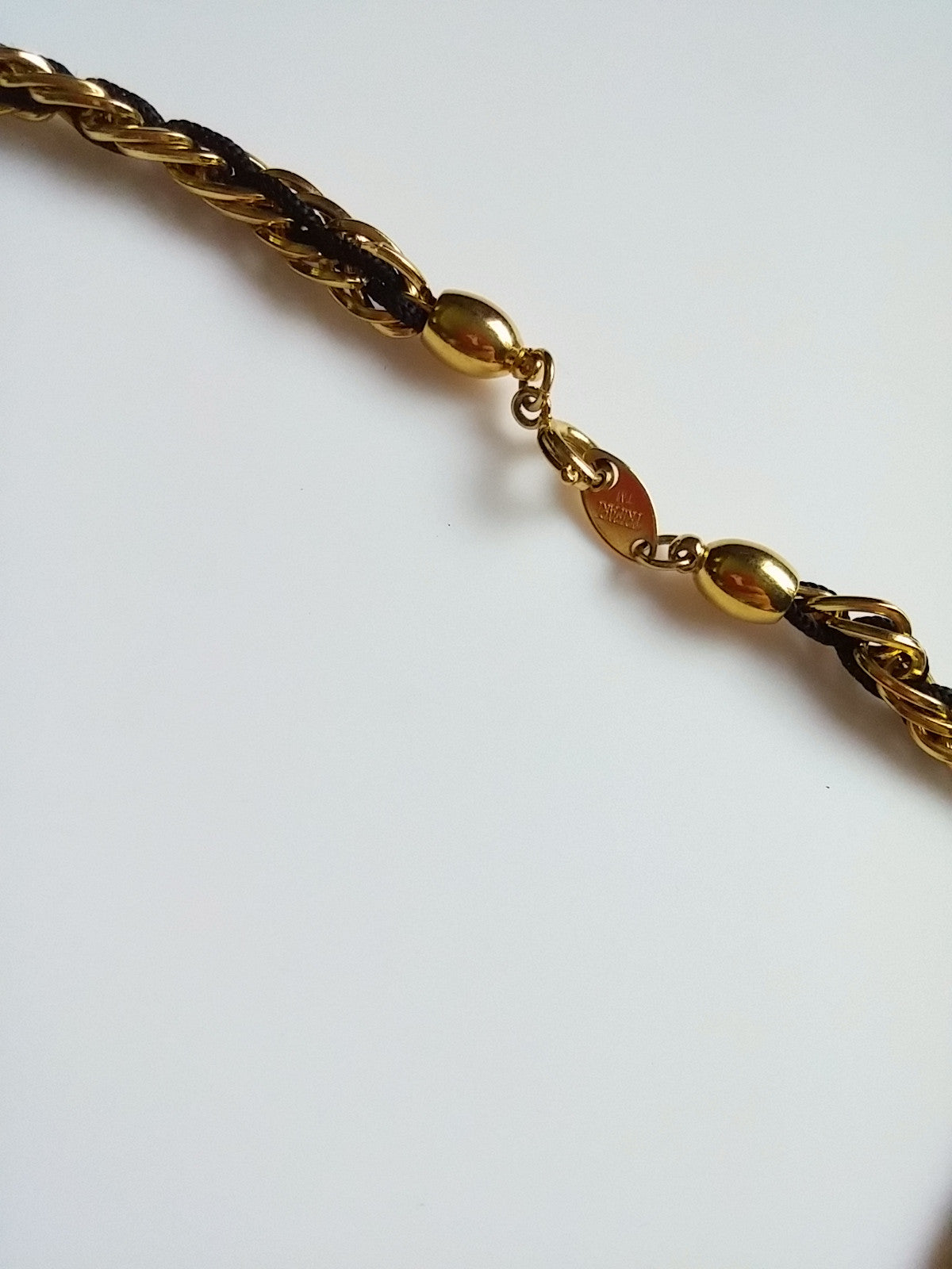 Vintage 80s Trifari Necklace Gold Tone Chain w/ Black Cord - Dirty 30 Vintage | Vintage Clothing, Vintage Jewelry, Vintage Accessories